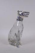 A silver plate and glass dog decanter, 24cm high