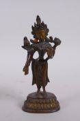 An Indian bronze figure of a standing female deity, 16cm high