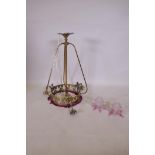 A brass pendant ceiling lamp with a tasseled fringe, lacks shades, 75cm drop, 36cm diameter