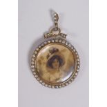 A Victorian 9ct gold mourning pendant set with seed pearls, 5cm drop, 3cm diameter