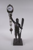 A brass and bronze Aviator mystery clock, 37cm high