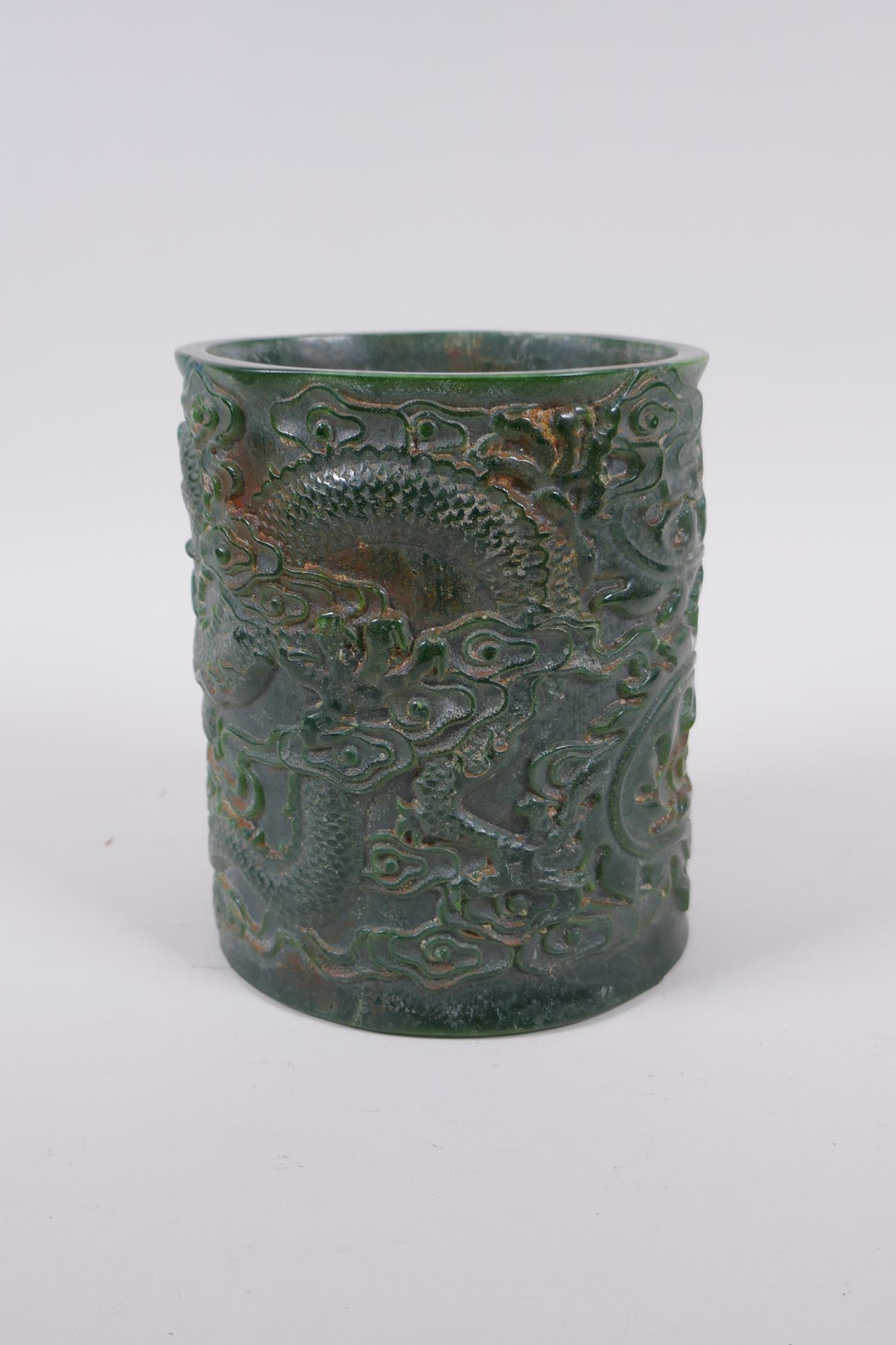 A Chinese carved green hardstone brush pot decorated with a dragon and phoenix, Qianlong seal mark - Image 4 of 6