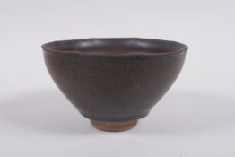 A Chinese Jian kiln bowl with lobed rim and hares fur glaze, 13cm diameter
