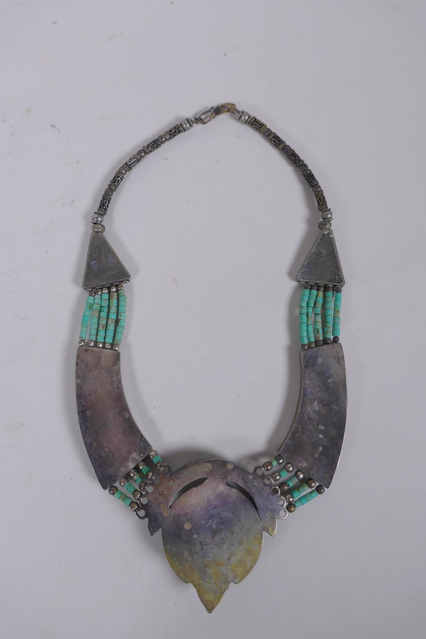 A Tibetan white metal necklace set with turquoise shards and coral, 40cm long - Image 4 of 4