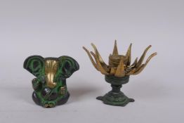 An Indian bronze censer/burner in the form of a lotus flower, and a bronze Ganesh idol, 8cm high
