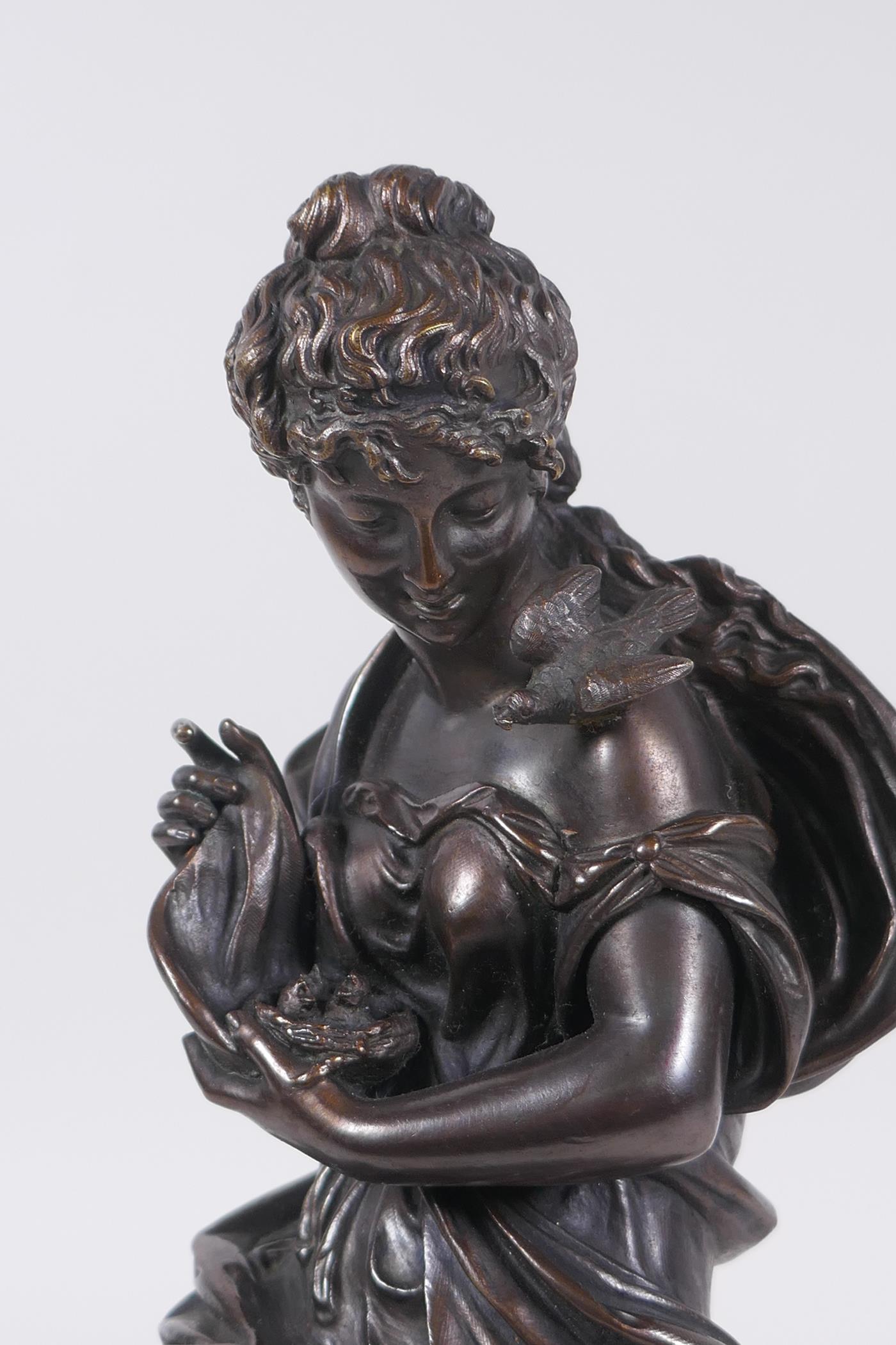 After Emile Bruchon, a late C19th/early C20th French bronze of a seated woman holding a nest of - Image 2 of 7