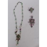 A C19th French silver pendant set with pink and green crystal stones and seed pearls, 7cm long, a
