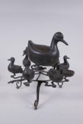 An Indo Persian bronze spice box in the form of birds, 28cm high, 30cm diameter