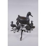 An Indo Persian bronze spice box in the form of birds, 28cm high, 30cm diameter