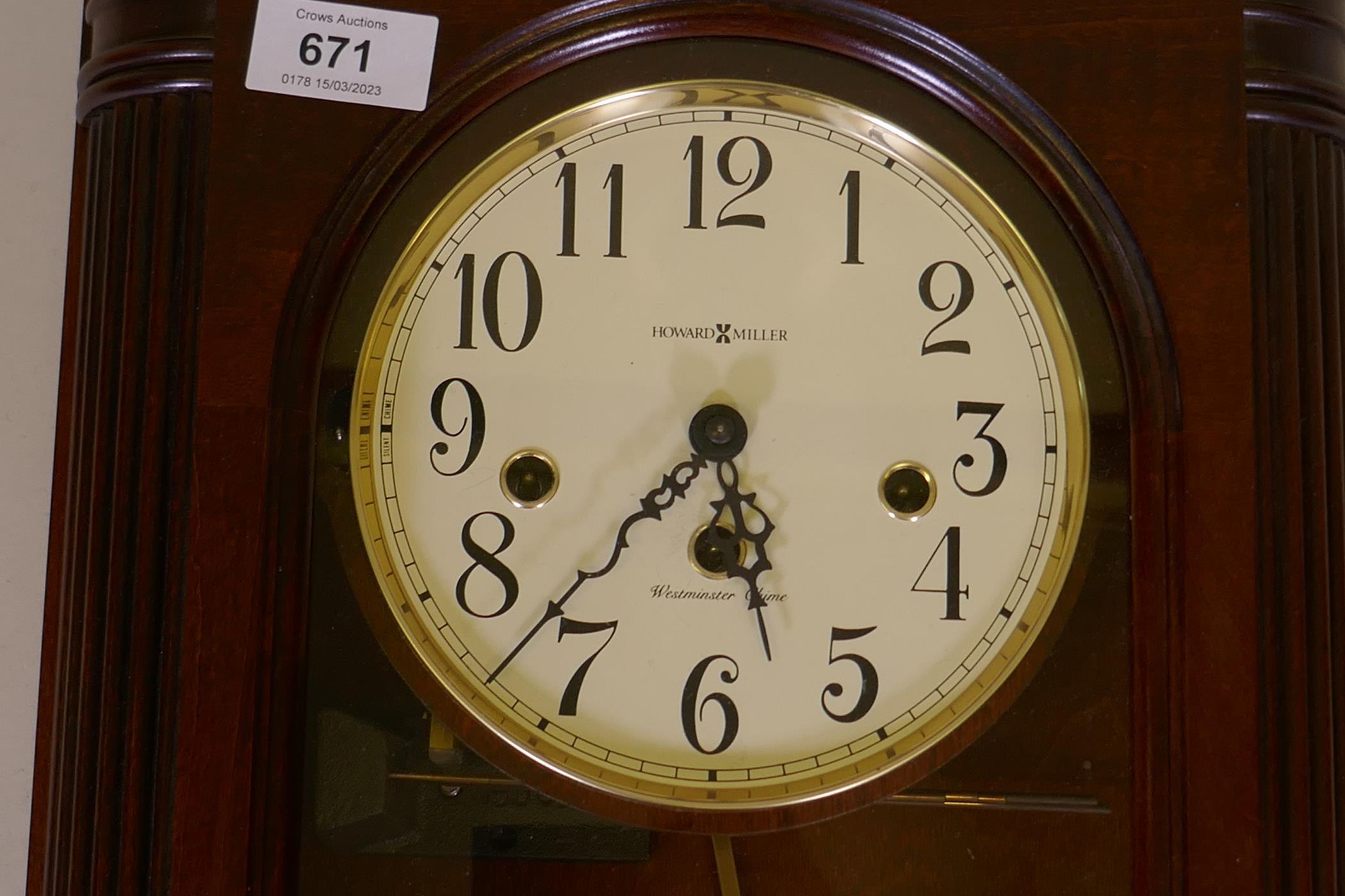 A Howard Miller mahogany cased wall clock, with spring driven movement and Westminster chimes, - Image 2 of 2