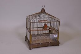 A vintage brass bird cage, 40cm high