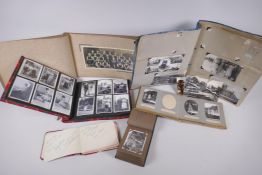 A collection of early C20th photo albums, postcard albums and autograph books, of social