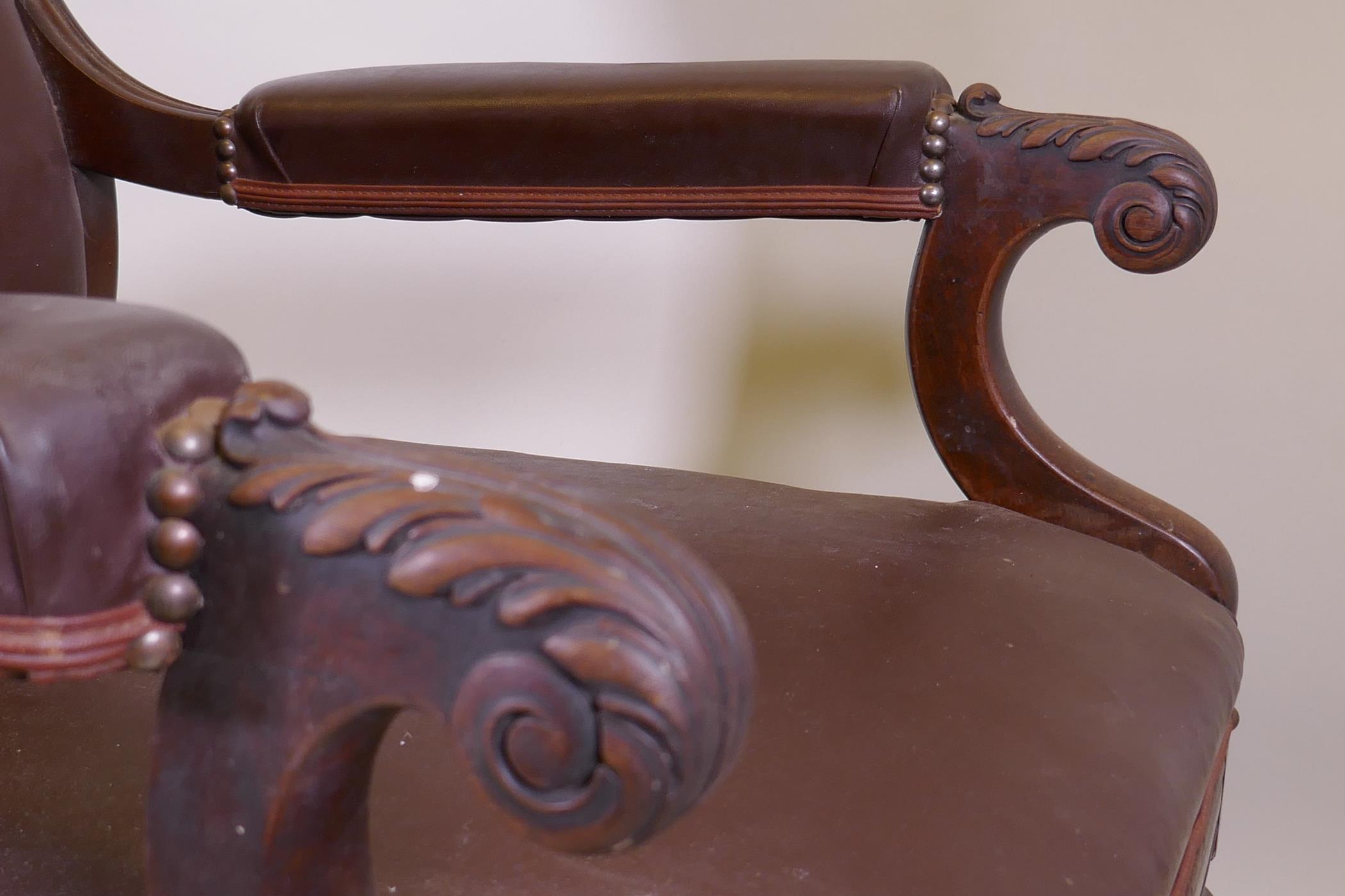 A C19th mahogany show frame armchair with reeded frame and carved and scrolled arms, raised on - Image 6 of 7