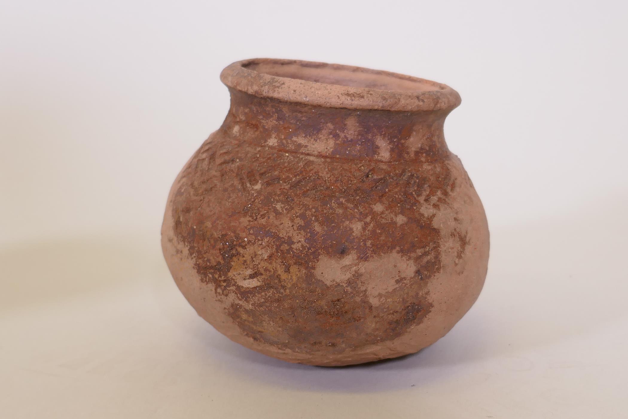 A Chinese Tang dynasty terracotta pot, labelled Hu Xian storage jar, another jar, Longshan, labelled - Image 2 of 8