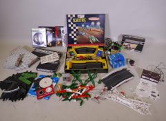 A 1962 Triang Scalextric set CM34 with lights, including a Lister Jaguar C.56, and an Aston Martin