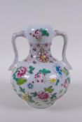 A garlic head shaped porcelain two handled vase, with famille rose enamel floral decoration, Chinese