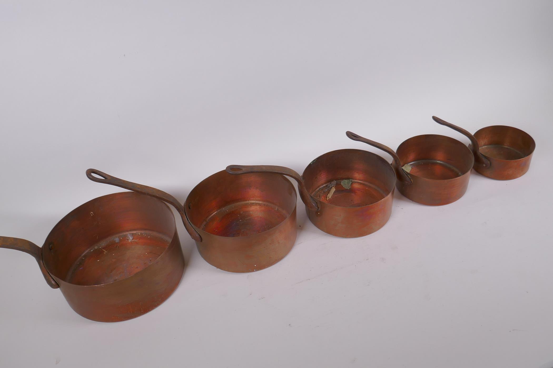 A set of five graduated copper sauce pans, largest 15cm diameter - Image 2 of 3