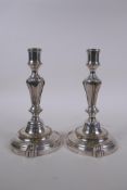 A pair of C19th Art Nouveau silver plated candlesticks, 20cm high