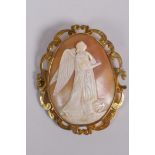A Victorian gilt metal cameo brooch decorated with an angel and anchor, 6 x 7cm