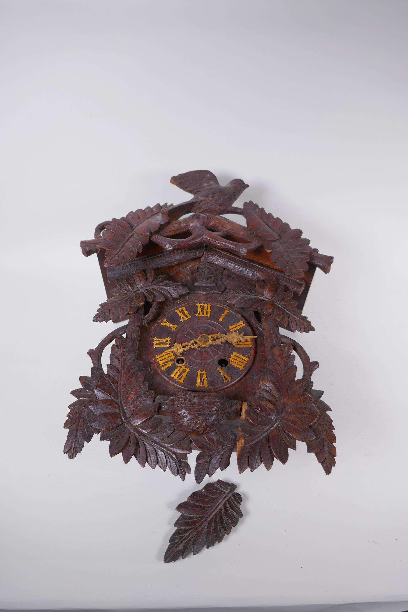 An antique carved Black Forest cuckoo clock, bellows intact, AF, 33 x 42cm - Image 2 of 7