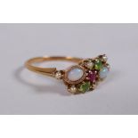 A Victorian gold ring, set with opals and seed pearls, 2.2g