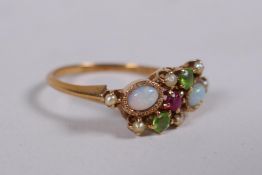 A Victorian gold ring, set with opals and seed pearls, 2.2g