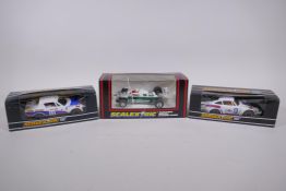 Three 1970s/80s Scalextric Cars to incluede a Porsche Turbo 935 C.125, a Triumph TR7 C.130, and a