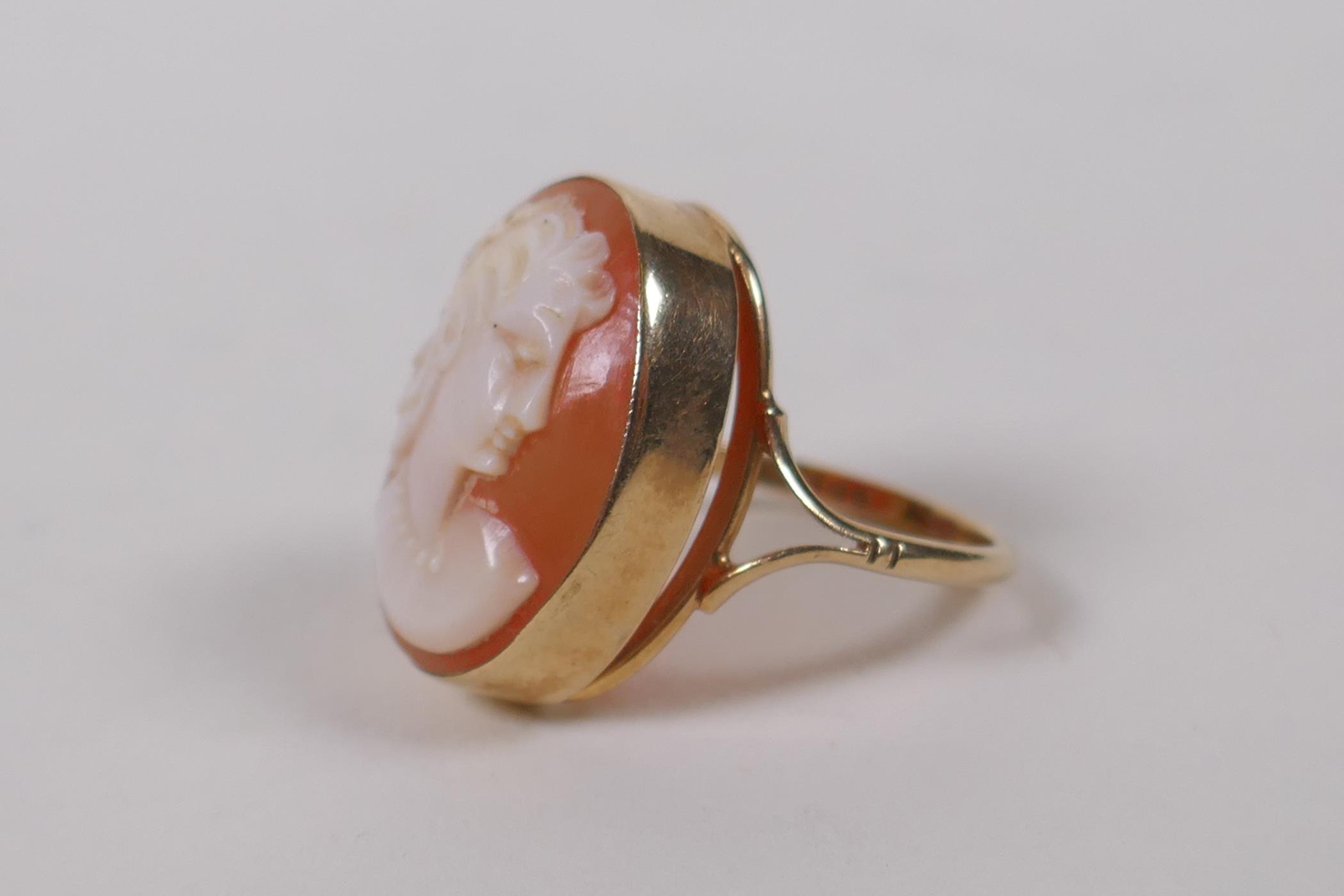 A 9ct gold dress ring, set with a cameo, Birmingham 1976, size N, gross weight 4.2g, with valuer's - Image 3 of 4