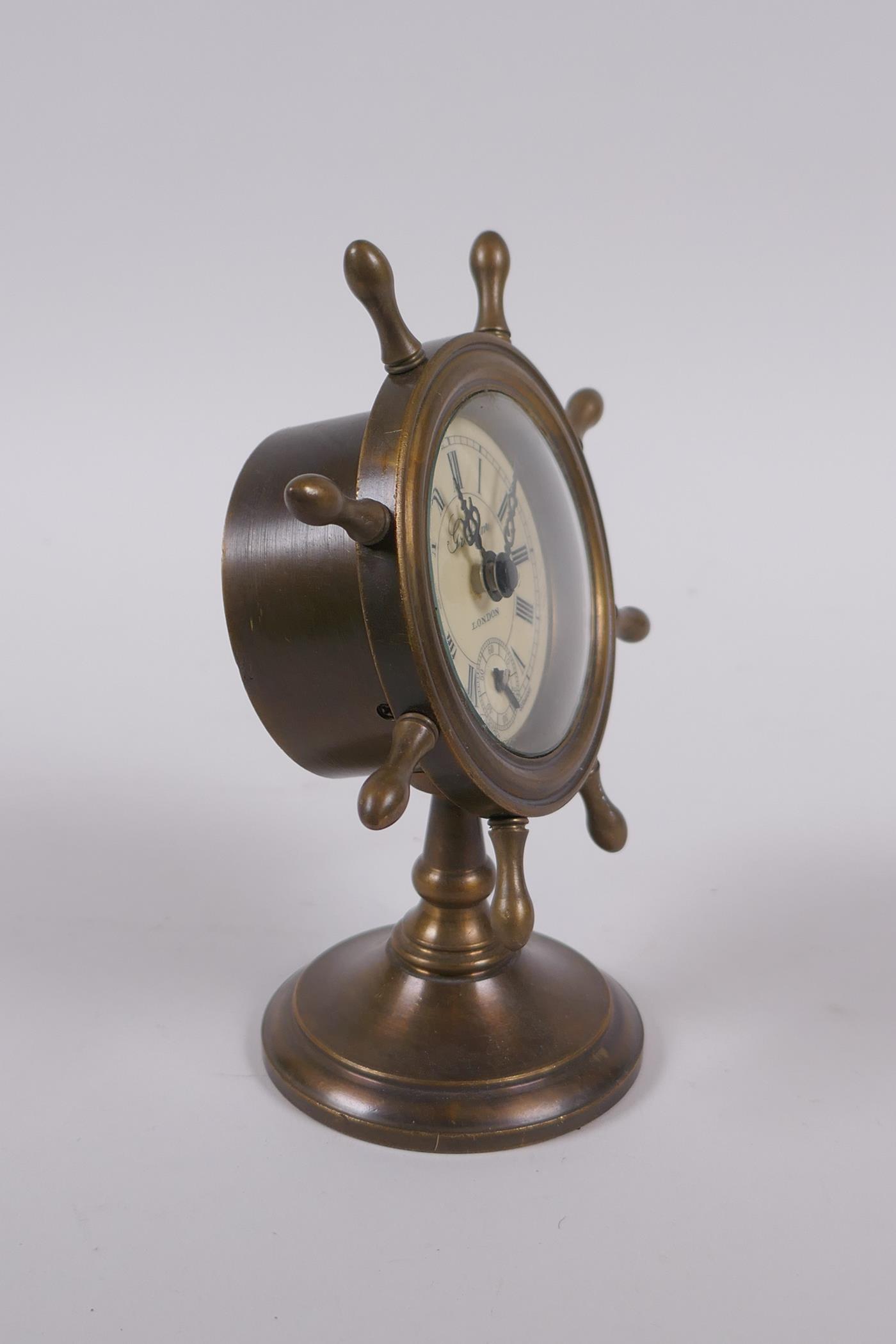 A brass cased desk clock in the form of a ship's wheel, 16cm high - Image 2 of 3