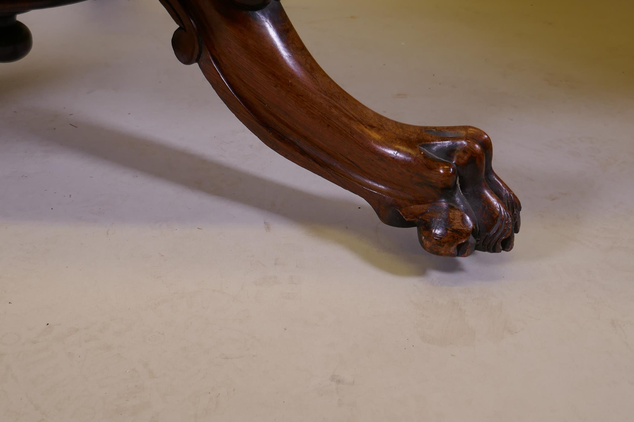 A Victorian rosewood tilt top breakfast table, raised on turned column tripod supports and carved - Image 7 of 7