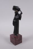 After Bergman, cold painted bronze of a water carrier, 19cm high