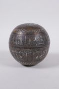 An Islamic bronze ball shaped box with multi metal inlaid animal and script decoration, 11cm