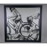 A photographic print on canvas of bike riding girls, 70 x 70cm