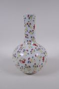 A Chinese polychrome porcelain bottle vase with all over bat decoration, Chinese GuangXu 6 character