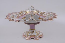 A continental Sevres style porcelain centre piece with pierced handles and gilt highlights, 35 x