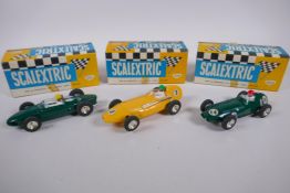 Three 1960s Triang Scalextric cars to include a B.R.M. C.59, a Vanwall C.55, and a Ferrari 156 C.62,