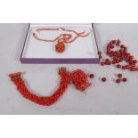 A vintage coral bead necklace with pendant and 9ct gold clasp, a coral bead bracelet and brooch, 5cm