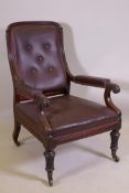 A C19th mahogany show frame armchair with reeded frame and carved and scrolled arms, raised on