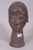 An African bronze bust head of a female with braided hair, 33cm high