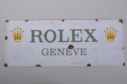 A vintage style 'Rolex Geneve' enamel advertising sign, 58 x 23cm