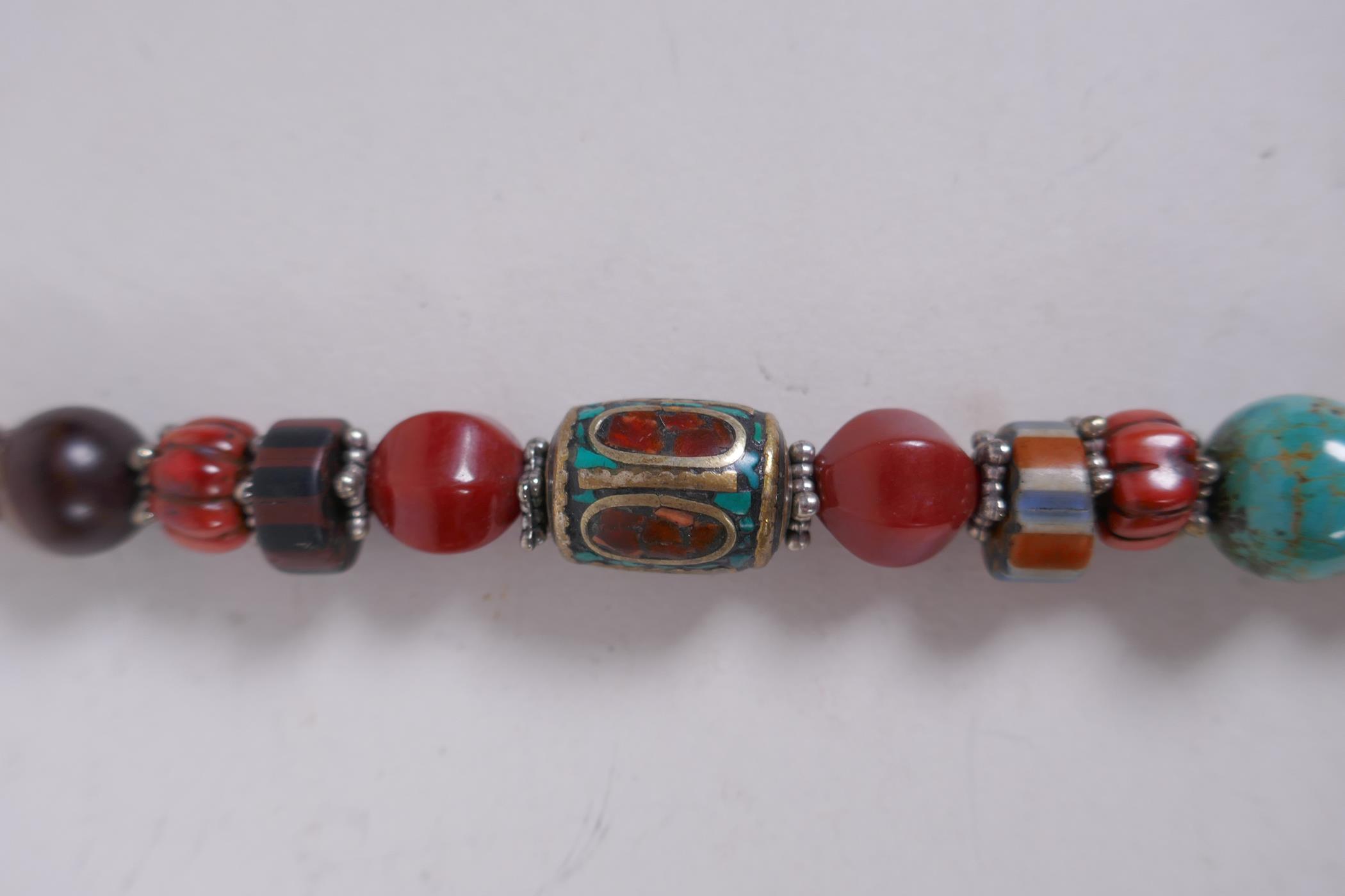 An oriental enamelled white metal, agate, coral, turquoise and multicolour glass bead necklace, 62cm - Image 3 of 4