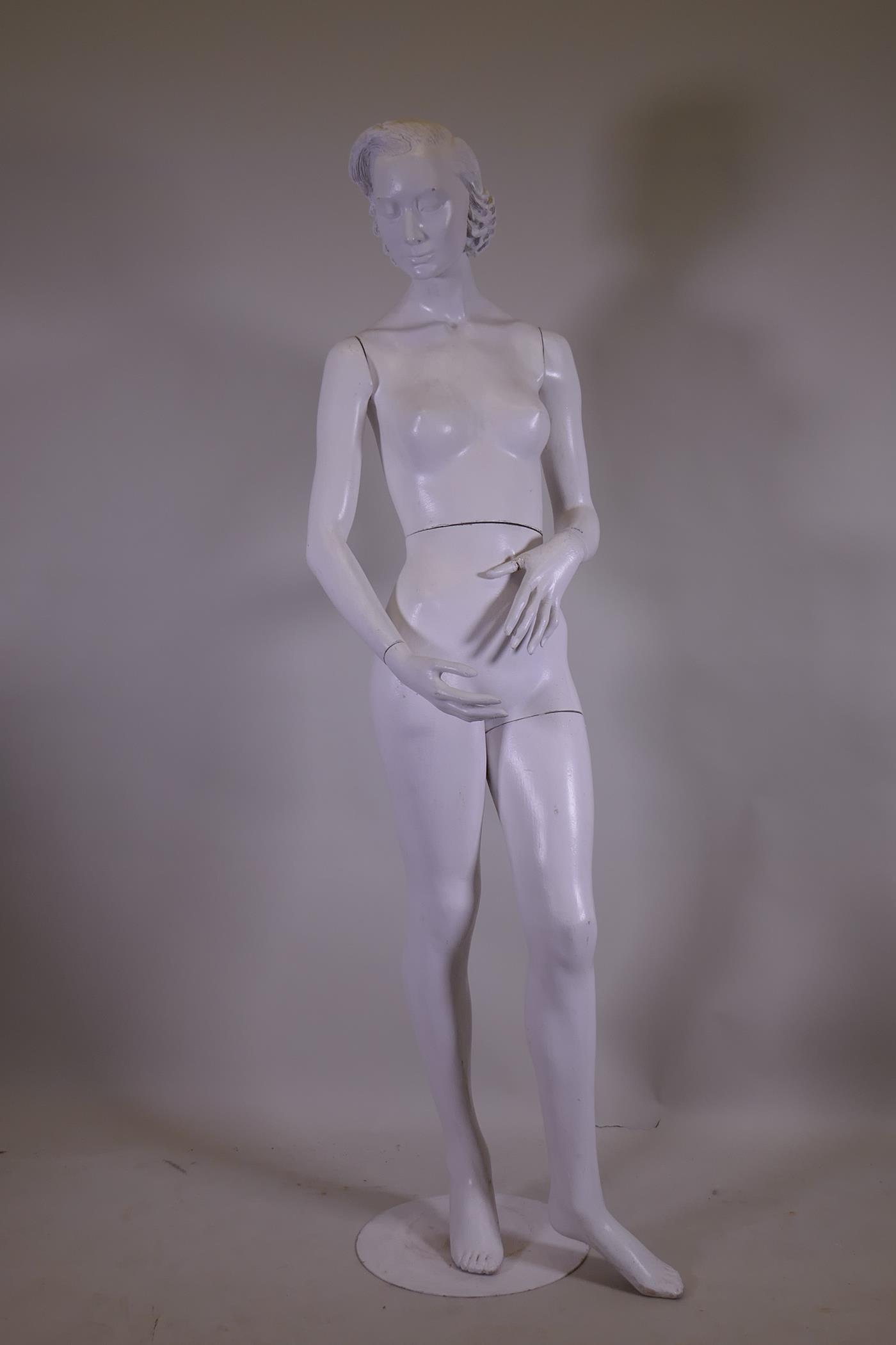 A vintage shop mannequin, 174cm high