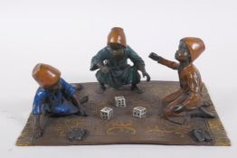 An Austrian style cold painted bronze figure of three Moorish boys playing dice, 20 x 14cm