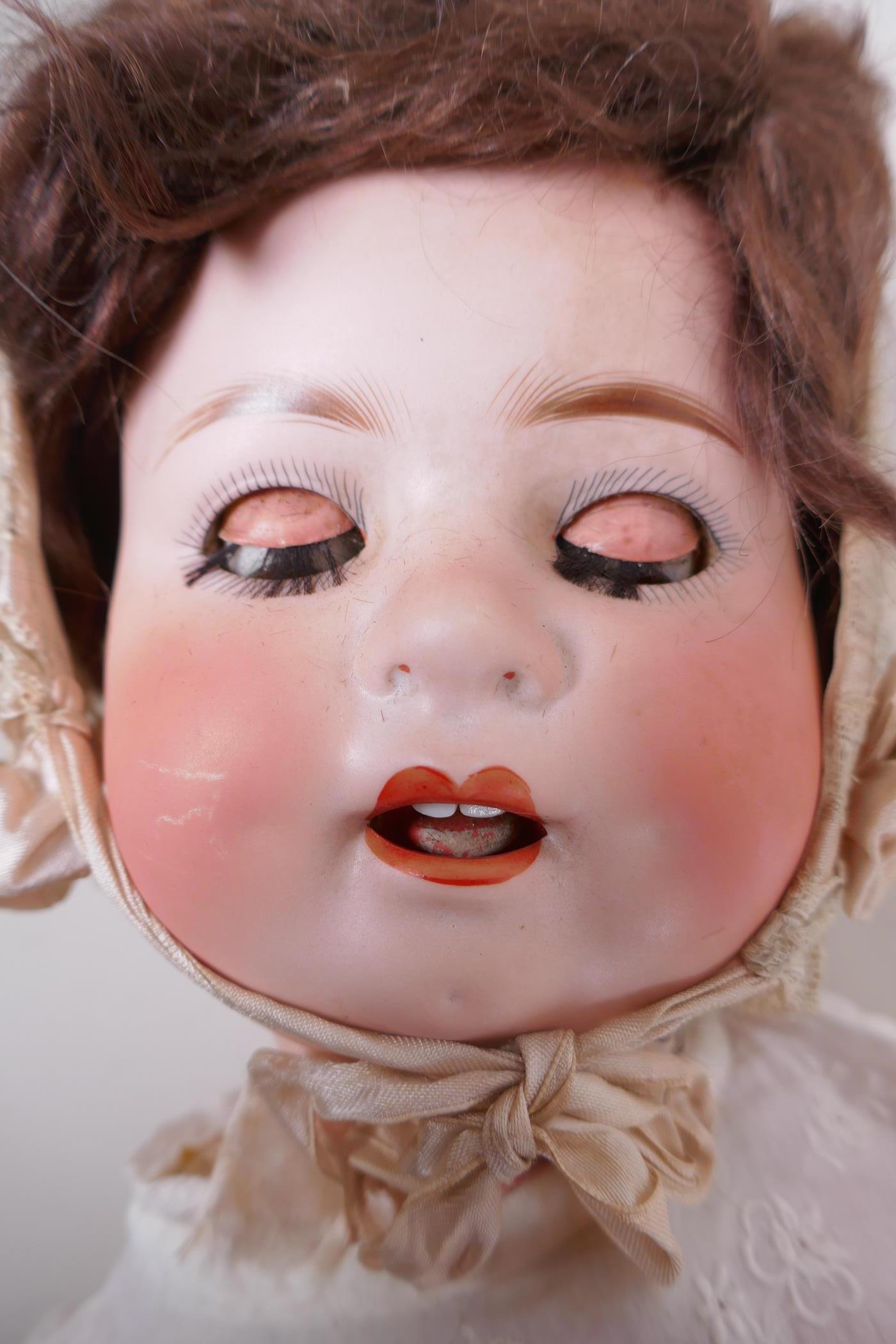 An antique German Heubach Koppelsdorf bisque headed toddler doll with brown sleeping eyes, moving - Image 3 of 5