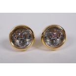 A pair of gilt metal 'watch movement' cufflinks