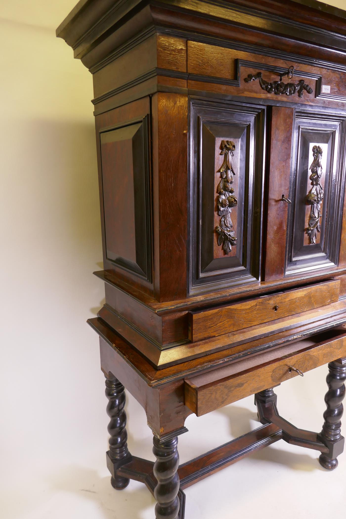 A C19th Continental rosewood cabinet on stand, with carved and ebonised detail, the upper section - Image 6 of 8