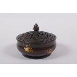 A Chinese gilt splash bronze censer and pierced cover, with bat and auspicious symbol decoration,