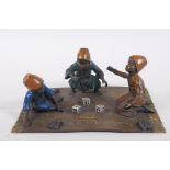 An Austrian style cold painted bronze figure of three Moorish boys playing dice, 20 x 14cm