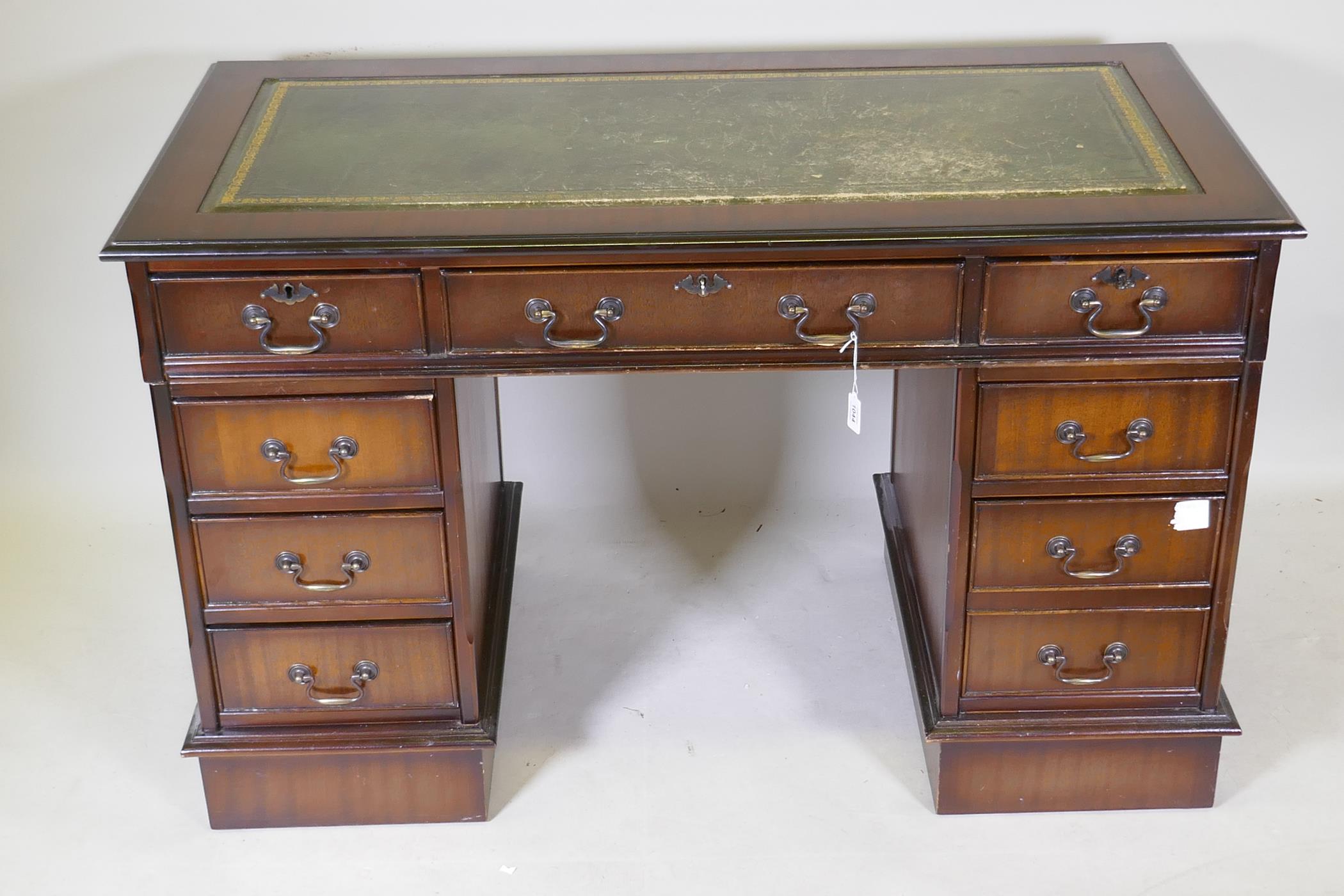 A Victorian style mahogany eight drawer pedestal desk, with leather inset top, raised on a plinth, - Image 2 of 3