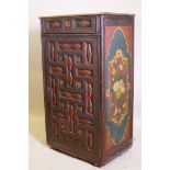 An early C19th east European painted pine cupboard, with moulded decoration, single drawer over
